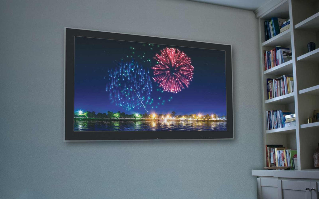 digital fireworks playing on a wall mounted tv